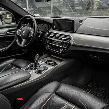 Interior before detailing — dust and grime on dashboard and seats