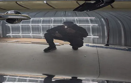 Ceramic-coated vehicle finish reflecting studio lighting at Detail Now, Taylor, TX